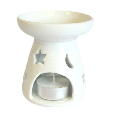 white ceramic oil burner with tea light moon and stars design