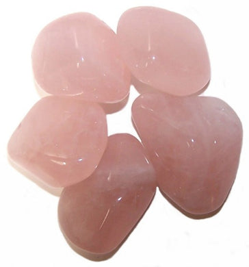 five rose quartz tumble stones